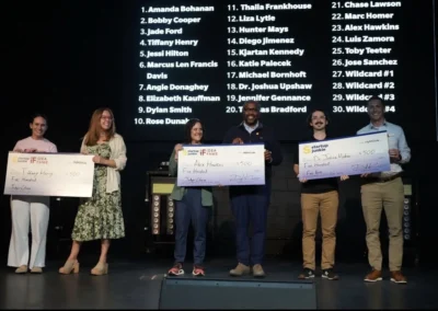 IdeaFame 2026 winners with prize checks