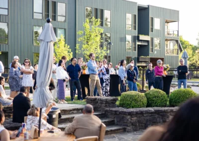 Guests mingle at golden hour during the Kiva NWA Party 2026