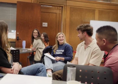 Founders share a laugh at a Startup Junkie roundtable workshop